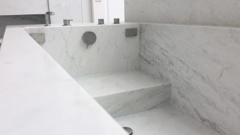 elegant bathtub in Carrara marble