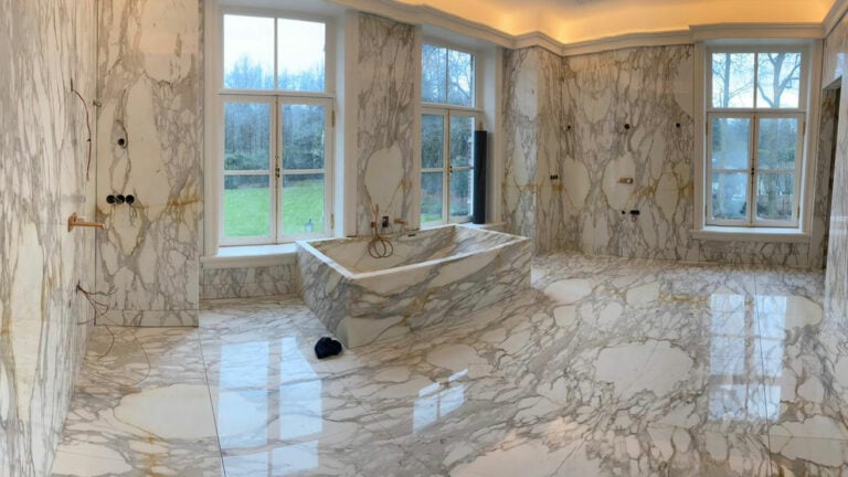 calacata gold marble bathroom