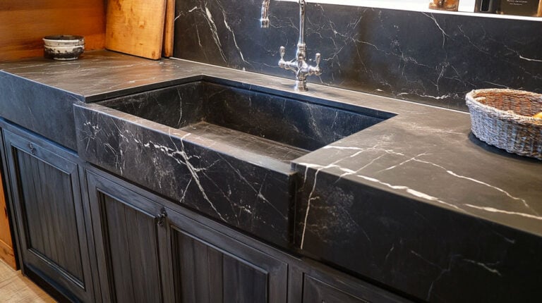 traditional kitchen with black marble countertop